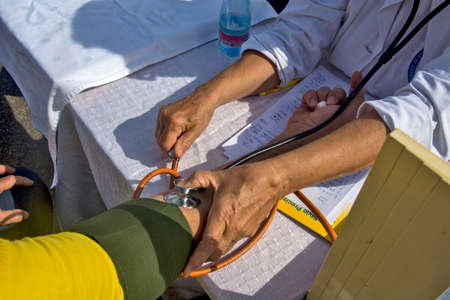 Zrenjanin, Serbia, September 28, 2019. Preventive action of medical control organized on the streets. Citizens on the street have their blood sugar levels and blood pressure controlled.のeditorial素材