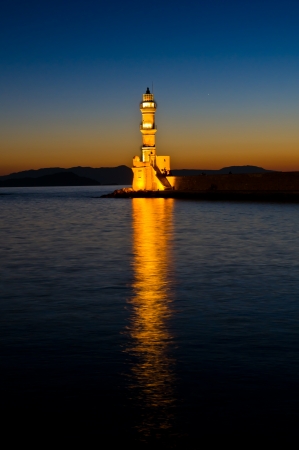 Old venetian lighthouse at the entrance of Hanya harbour, Creteの写真素材
