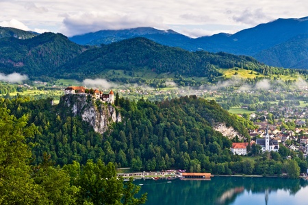 A view of Bled castle  old city  of Bled and a  new  village below の写真素材