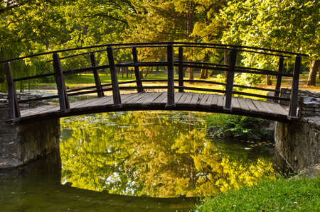 Closeup of a wooden bridge in a parkの写真素材