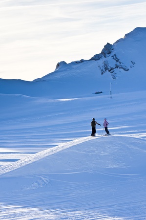 Two skiers near the top of Kaprun glacierの写真素材