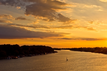 Sailboat at sunset on Sava river, Belgrade, Serbia