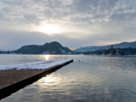 Winter morning on lake Bled in Slovenian Alpsの写真素材
