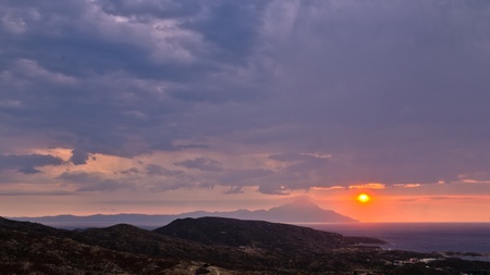 Stormy morning sunrise  at holy mountain Athos, Macedonia, Greeceの写真素材