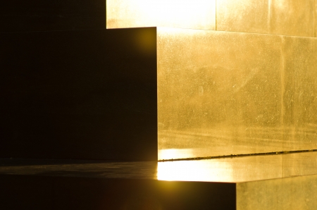 Golden marble pyramid steps at sunsetの写真素材