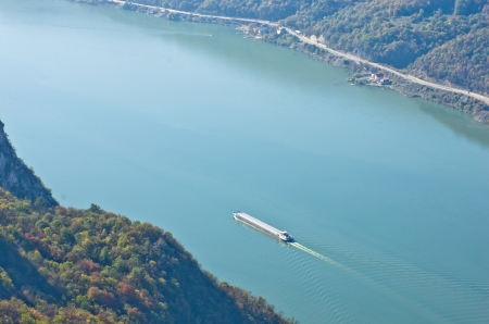 Ship sail on Danube river through Djerdap gorge, east Serbiaの写真素材