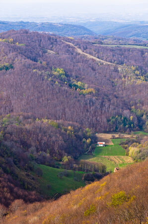 Homolje mountains landscape with a little green valley on a sunny autumn day, east Serbiaの写真素材