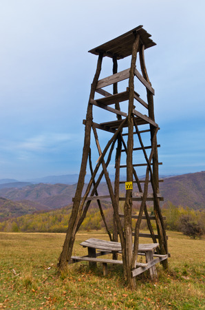 Hunting watchtower on a mountain meadow at sunset, east Serbiaの写真素材