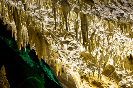 Detail of illuminated cave ceiling with a lot of amazing natural decorations, Homolje mountains, east Serbiaの写真素材