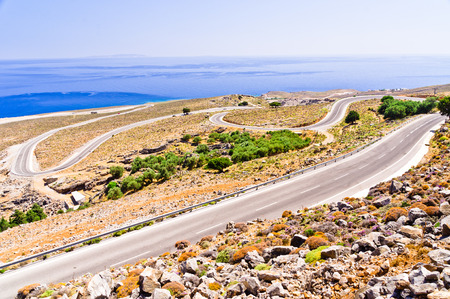 Landscape, road and view at Lybian sea coast at south side of Crete island, Greeceの写真素材