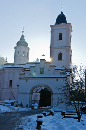 Monastery Beocin covered with snow at sunny winter morning, near Novi Sad, Serbiaの写真素材