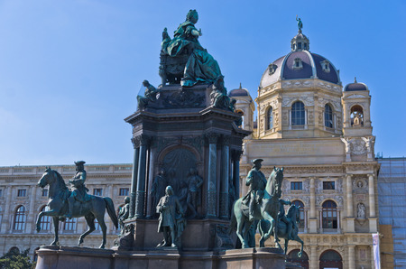 Maria Theresa statue in a garden with a lot of historical figures around her in front of Art History museum on Maria Theresa square in Vienna, Austriaのeditorial素材