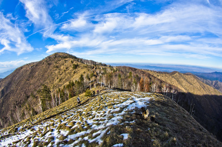 Hiking through mountain landscape in early spring, mount Stolovi, Serbiaの写真素材