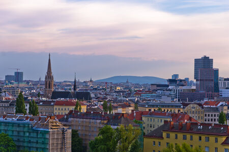 Vienna cityscape at sunset, mix of different ages, styles and colors, Austriaの写真素材