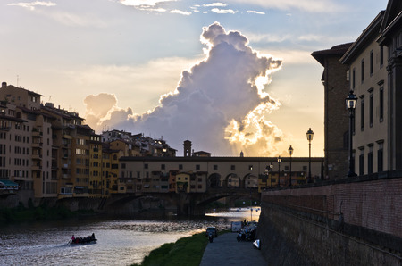 Ponte Vecchio bridge in Florence at sunset, Tuscany, Italyの写真素材