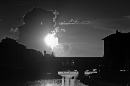 Ponte Vecchio bridge in Florence at sunset, Tuscany, Italyの写真素材