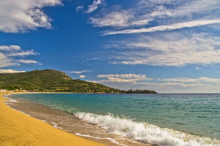 Wide view of a beautiful sandy beach at small greek village Toroni, Sithonia, Greeceの写真素材