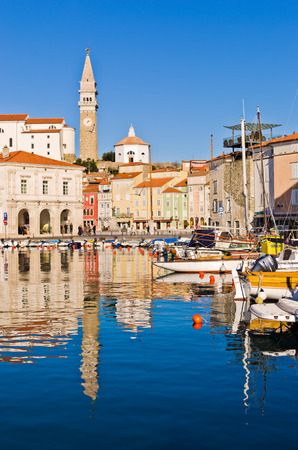Piran harbor, bell tower and Tartini square in background, Istria, Sloveniaのeditorial素材