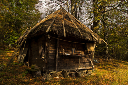 Wooden mountain hut at sunny autumn day, Radocelo mountain, central Serbiaの写真素材