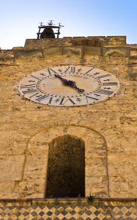 Bell and clock tower at Monreale cathedral near Palermo Sicily Italyの写真素材