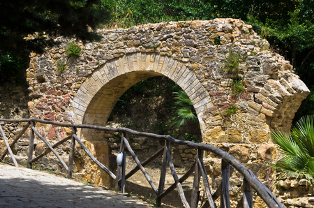 Ruins of old aquaduct near famous roman villa at Piazza Armerina Sicily Italyの写真素材
