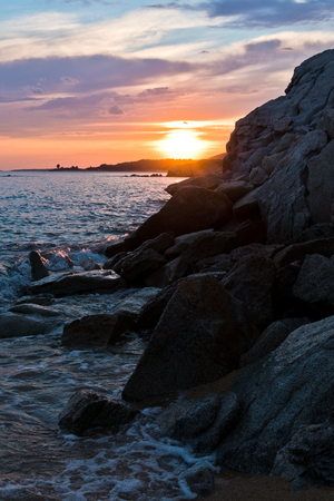 Sea rocks at sunset, west coast of peninsula Sithonia, Chalkidiki, Greeceの写真素材
