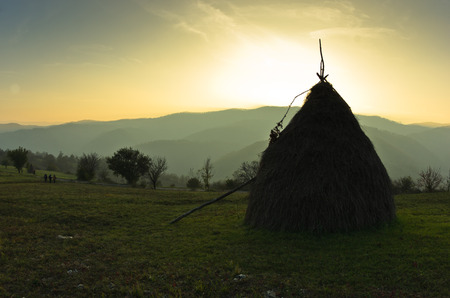 Trekking through mountain meadows near Danube river at sunset in Serbia