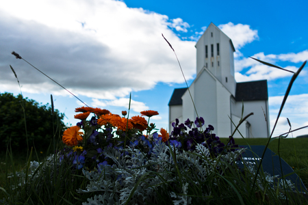 Church and graveyard at Skalholt monastery. Skalholt was, through eight centuries, one of the most important places in Iceland as a cultural and political center.の写真素材