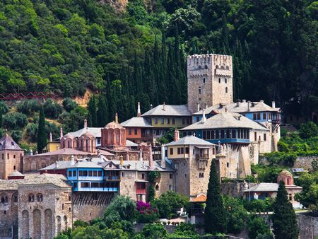 Greek monastery on a coast of aegean sea below the holy mountain Athos in Greece