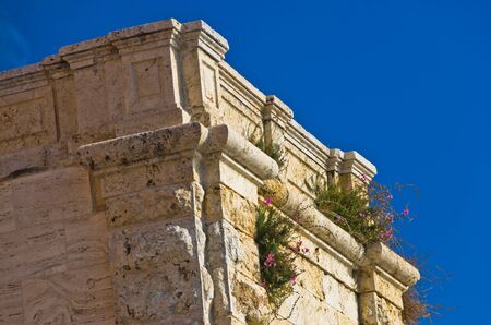 Architecture detail of old stone buildings in Cagliari downtown, Sardinia, Italy