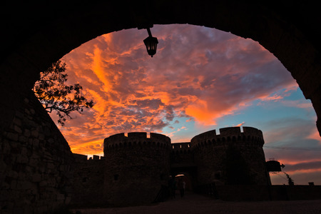 Silhouette of fortress towers of Kalemegdan fortress at dramatic colorful sunset, Belgrade, Serbiaのeditorial素材