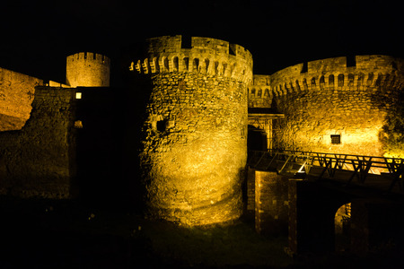 Kalemegdan fortress wooden bridge, gates and towers at night in Belgrade, Serbiaのeditorial素材