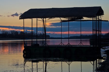 Sunset on a lake at Ada river island in Belgrade, Serbiaの写真素材