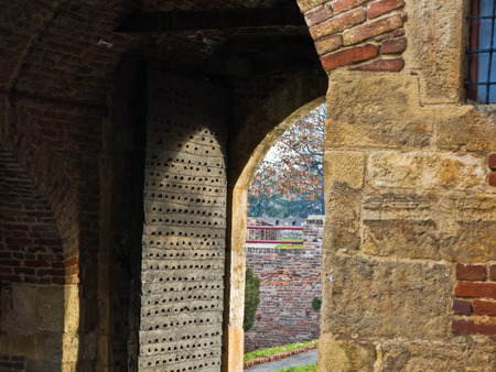 Old gate doors and other architectural detail at Kalemegdan fortress on a sunny autumn day in Belgrade, Serbiaの写真素材