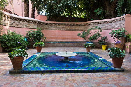 Little fountain at Majorelle garden in Marrakech, Morocco, Africaの写真素材