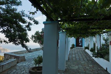 Viewpoint from a monastery on a hill over Skopelos town at sunrise, island of Skopelos, Greeceの写真素材
