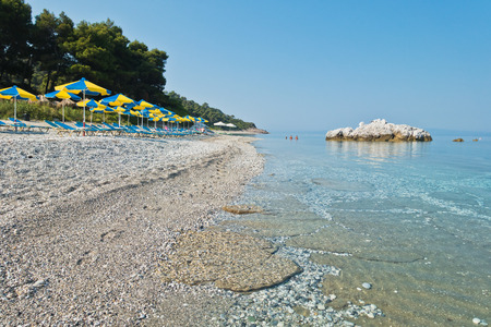 Sea rocks at calm and crystal clear turquoise water at morning, Milia beach, island of Skopelos, Greeceの写真素材