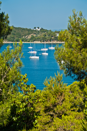 Sailboats at bay in front of Koukounaries beach, morning at Skiathos island, Greeceのeditorial素材