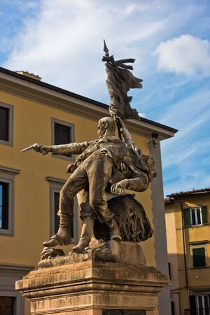 Historic monument at small square in downtown of Florence, Tuscany, Italyの写真素材