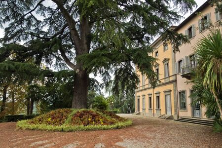 Hiking backroads of Tuscany near beautiful villas at Monaciano, near Siena, Italyの写真素材