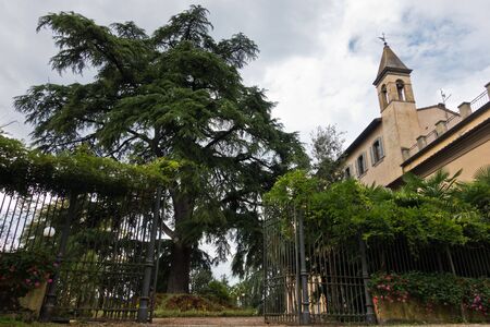 Hiking backroads of Tuscany near beautiful villas at Monaciano, near Siena, Italyの写真素材