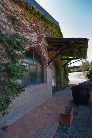 Entrance to wine cellar at a farm in Tuscany, near San Gimignano, Italyの写真素材