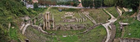 Roman theatre of Voltera, a view from Volterra city walls, Tuscany, Italyの写真素材