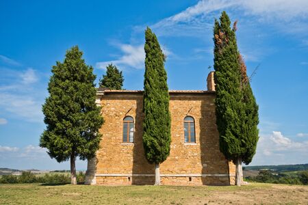 Famous chapel Cappella Madonna di Vitaleta near Pienza, Siena province, Tuscany, Italyの写真素材