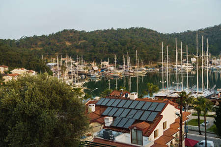 Fethiye city, marina and harbor at calm summer sunset, Turkey