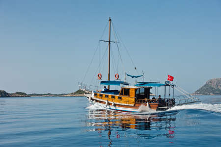 Sunny day at sea, boat is heading to Kekova island, near city of Kas, Turkeyの写真素材