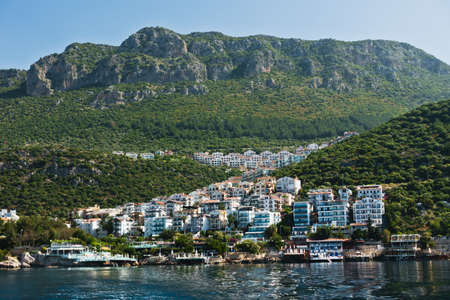 Panorama of a city with mountain landscape in background, city od Kas, Lycia, Turkeyの写真素材