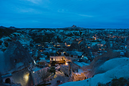 Panorama at blue hour from a top of a hill over Goreme at Cappadocia, Anatolia, Turkeyの写真素材