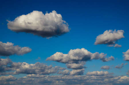 Clear blue sky with incoming stormy clouds