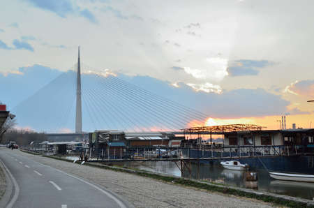 Cable-stayed bridge on river Sava in dusk timeの写真素材